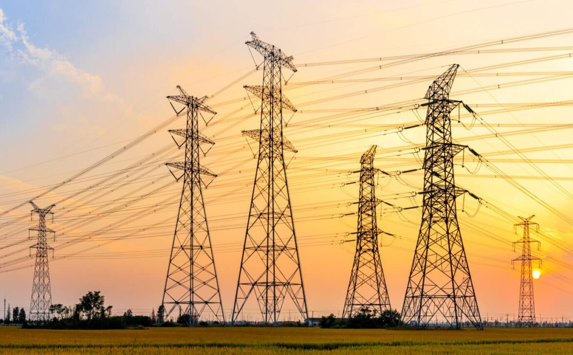 High-voltage,Power,Lines,At,Sunset,high,Voltage,Electric,Transmission,Tower